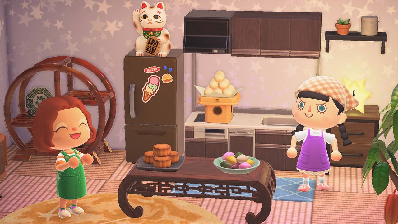 Deux personnages celebrent le Festival de la Lune avec des gateaux de lune dans Animal Crossing New Horizons